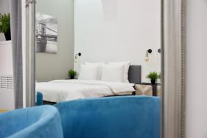 Posteľ alebo postele v izbe v ubytovaní Standard Apartment by Hi5 - Nagysándor street