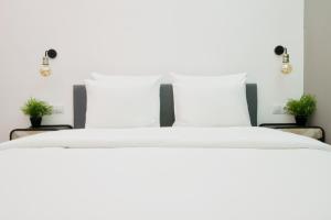 Posteľ alebo postele v izbe v ubytovaní Standard Apartment by Hi5 - Nagysándor street