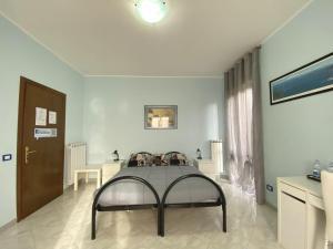 TV a/nebo společenská místnost v ubytování B&B Il Moai