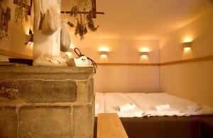 Postel nebo postele na pokoji v ubytování Le Mirabeau Resort & Spa