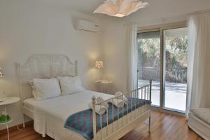Katil atau katil-katil dalam bilik di Nestor Hillside House by TrulyCyprus