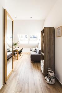 Posteľ alebo postele v izbe v ubytovaní Apartamenty Forma Tatrica