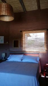 Кровать или кровати в номере La Chakana