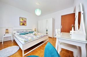 Postel nebo postele na pokoji v ubytování Apartment Ema Old Town