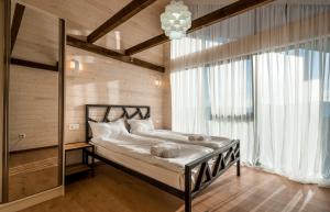 Kama o mga kama sa kuwarto sa GVC 3-room 422 New Gudauri