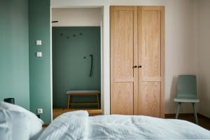 Posteľ alebo postele v izbe v ubytovaní Hotel a Hostinec Slunce