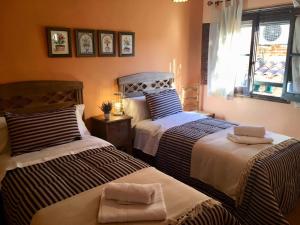 Postel nebo postele na pokoji v ubytování Apartamento La Alcancía
