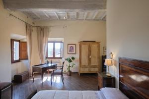 Postel nebo postele na pokoji v ubytování Palazzo Mazzini