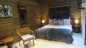 Postel nebo postele na pokoji v ubytování HOTEL IGUAIMA