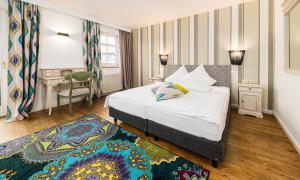 Postel nebo postele na pokoji v ubytování Hotel die Hindenburg