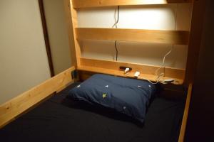 Postel nebo postele na pokoji v ubytování Guest house SHIE SHIMI