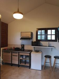 Kuchyň nebo kuchyňský kout v ubytování Bungalow Maelie + 3 fotografie