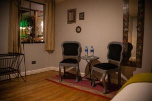 Posezení v ubytování Home Garden Hotel