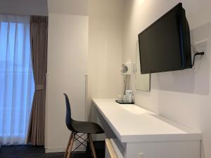 TV a/nebo společenská místnost v ubytování Hotel New Tohoku