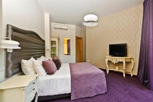 Tempat tidur dalam kamar di Jerusalem Inn by Smart Hotels