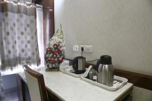 Kaffee-/Teezubehör in der Unterkunft Hotel Emerald