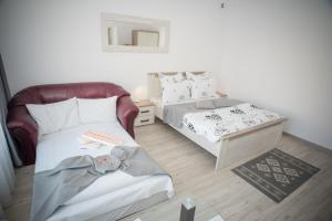 Katil atau katil-katil dalam bilik di Apartament LA MAL