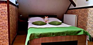 Fotografie z fotogalerie ubytování Pensiunea Micutul Vrajitor v destinaci Arefu + 13 fotografií