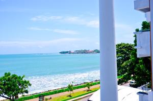 a view of the ocean from a building at Hotel Sea Line in Galle