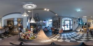 a room with a bowl of fruit on a table at Fuori Porta House in Bergamo