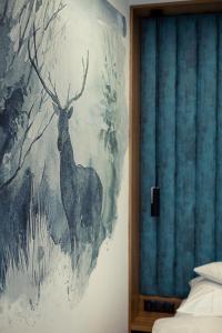 Posteľ alebo postele v izbe v ubytovaní Mountain Apartments Jagiellońska Residence