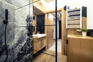 Kúpeľňa v ubytovaní Mountain Apartments Jagiellońska Residence