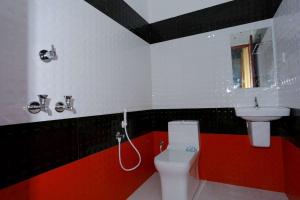 Kylpyhuone majoituspaikassa Dayout Regency