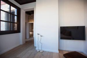 TV a/nebo společenská místnost v ubytování Casa Quindici in the Old Town