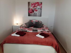 Postel nebo postele na pokoji v ubytování Apartments Barbi