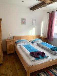 Llit o llits en una habitació de Tuxie Haus