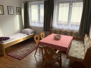 Llit o llits en una habitació de Tuxie Haus