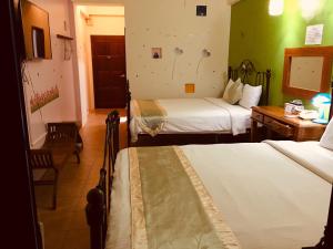 Voodi või voodid majutusasutuse Morpheus B&B toas