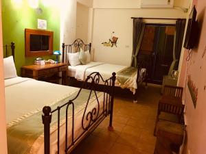 Voodi või voodid majutusasutuse Morpheus B&B toas