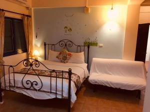 Voodi või voodid majutusasutuse Morpheus B&B toas