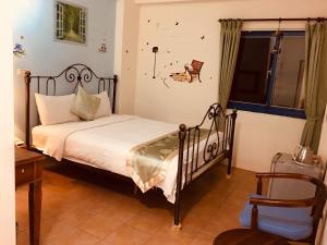 Voodi või voodid majutusasutuse Morpheus B&B toas