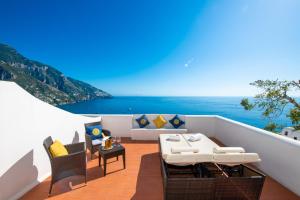 a balcony with a view of the ocean at La Casa di Peppe Guest House & Villa in Positano