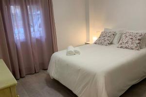 Posteľ alebo postele v izbe v ubytovaní RENOVATED HOUSE IN OLD TOWN MARBELLA.