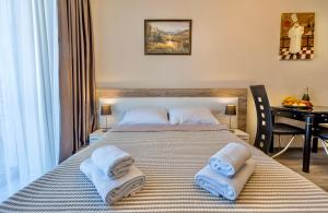Cama ou camas em um quarto em GVC 510 New Gudauri Mountain view