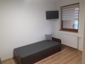Postel nebo postele na pokoji v ubytování Apartament Drawsko Pomorskie