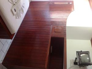 a stairway with wooden floors and a stair case at Cururupe Praia Hotel in Ilhéus