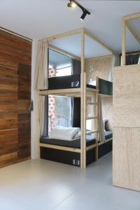 Postel nebo postele na pokoji v ubytování NANO Eco-Hostel