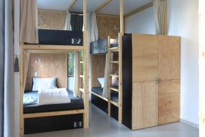 Postel nebo postele na pokoji v ubytování NANO Eco-Hostel