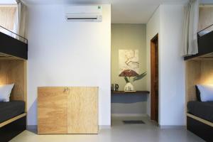 Postel nebo postele na pokoji v ubytování NANO Eco-Hostel