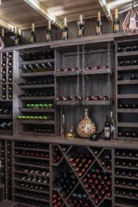 a wine cellar with lots of wine bottles at Machadinho Thermas Resort SPA in Machadinho