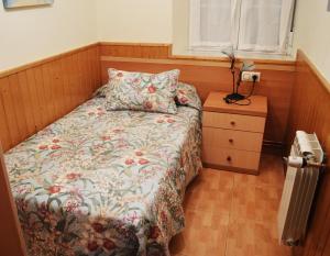 Postel nebo postele na pokoji v ubytování Apartamentos La Capitana