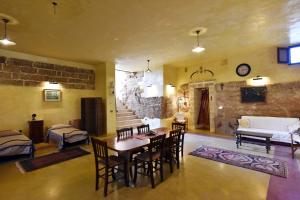 Μια τηλεόραση ή/και κέντρο ψυχαγωγίας στο Masseria La Maestà - Ospitalità Rurale Famigliare