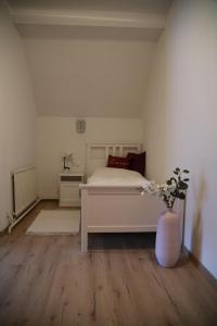 Postel nebo postele na pokoji v ubytování Apartments Marie B