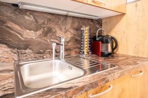 A kitchen or kitchenette at Fumerhof Még 37 kép
