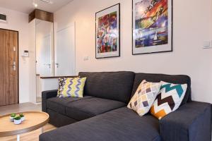 Część wypoczynkowa w obiekcie City Centre Modern Apartment Poznań Free Parking