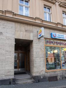 a store front of a building on a street at Apartman "Alika" in Karlovy Vary